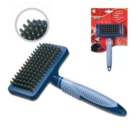 Brush with rubber pins