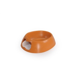 Bowl with bamboo handle in the shape of a bone